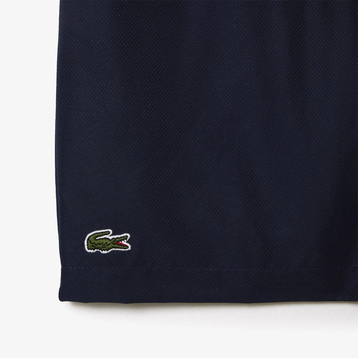 SHORT LACOSTE JUNIOR CORE PERFORMANCE