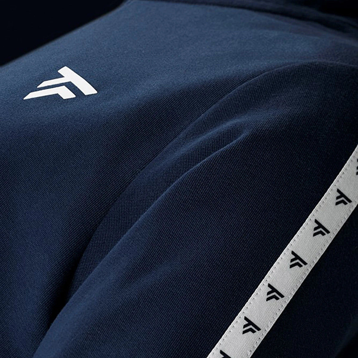 SWEAT TECNIFIBRE 1/2 ZIP A CAPUCHE